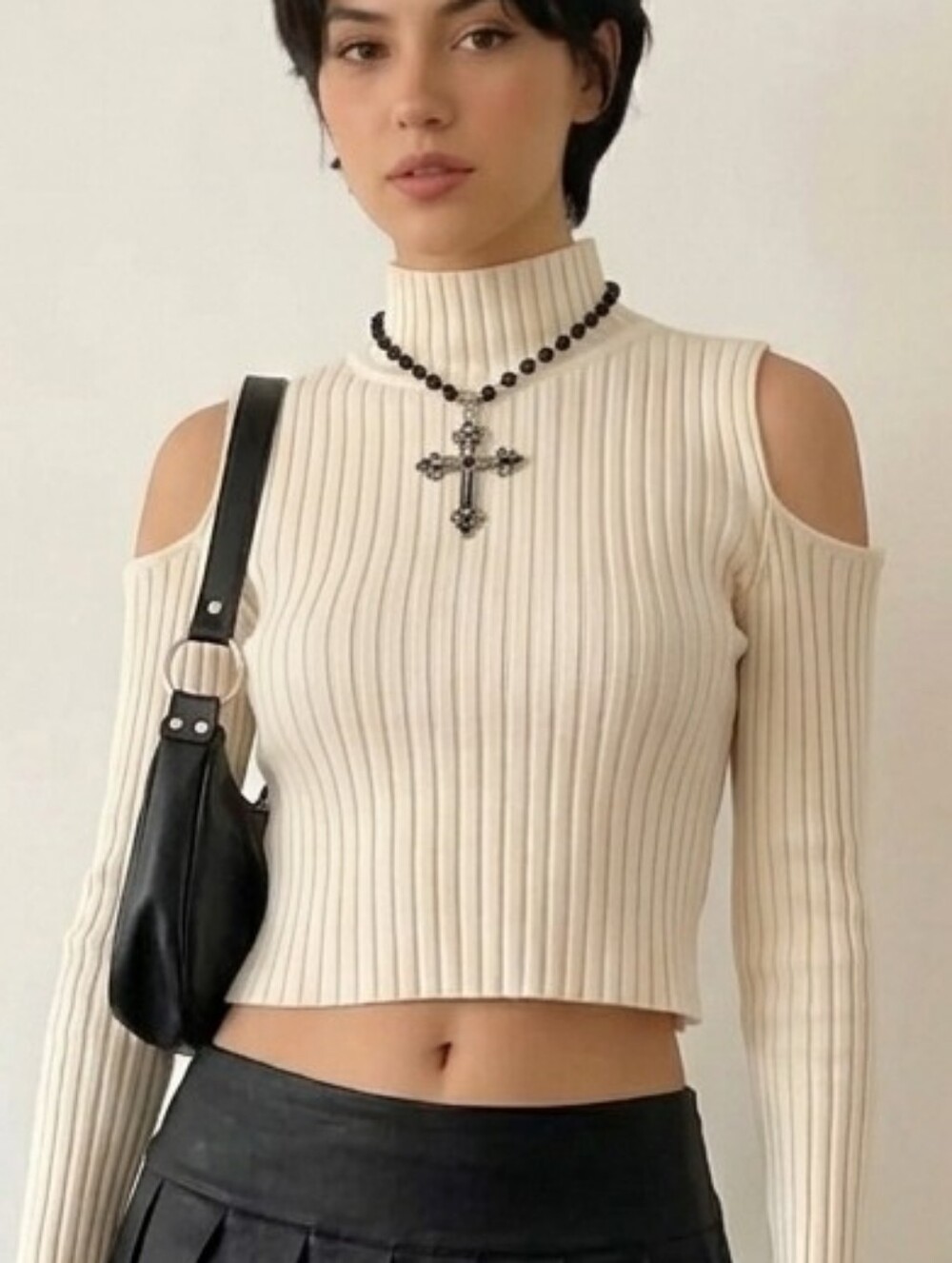 Shoulder cutout cream mockneck sweater